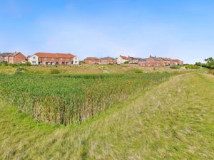 Water Retention Pond, property on opposite side- click for photo gallery
